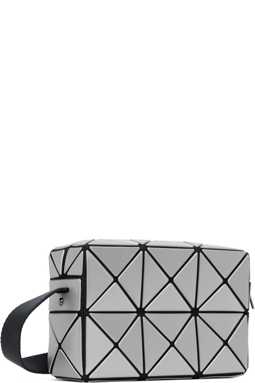 Mesh shoulder bag.

· Signature triangular faux-leather appliqués in silver tone
· Adjustable and semi-detachable webbing shoulder strap
· Zip closure
· Patch pocket at interior
· Logo-woven lining
· H4.5" x W7" x D2.25"

Supplier color: Silver