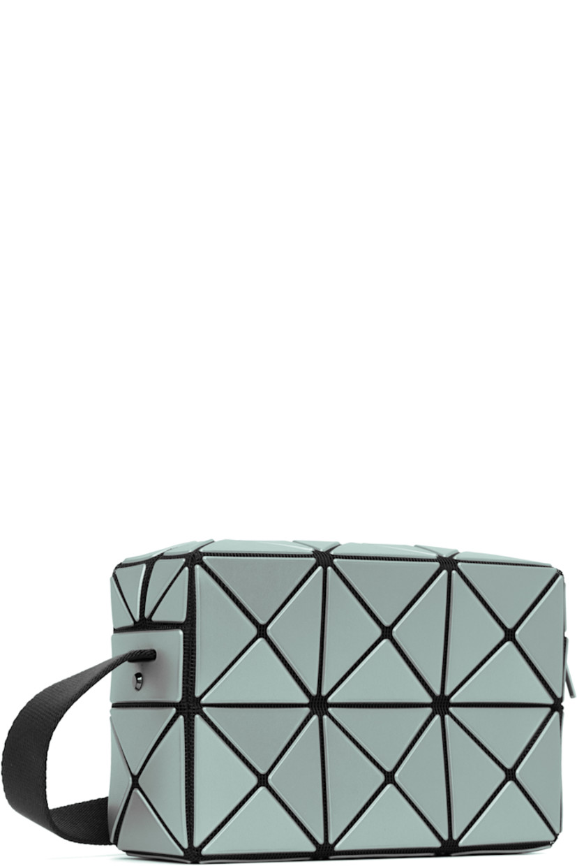 Mesh shoulder bag. 

· Signature triangular faux-leather appliqués in blue
· Adjustable and semi-detachable webbing shoulder strap
· Zip closure
· Patch pocket at interior
· Logo-woven lining
· H4.5" x W7" x D2.25"

Supplier color: Light blue