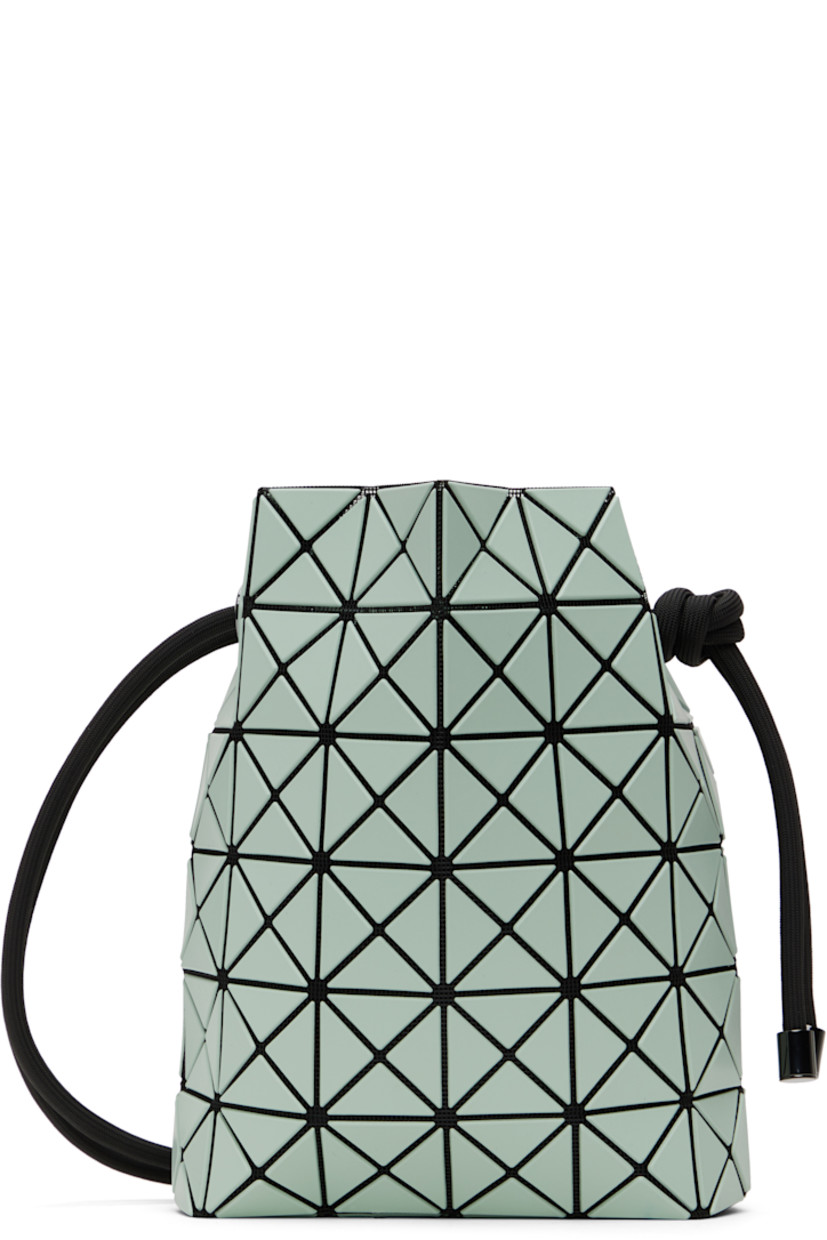 Mesh shoulder bag in black. 

· Triangular faux-leather appliqués in green throughout
· Adjustable drawstring shoulder strap
· Open throat
· Zip pocket at interior
· Patterned textile lining
· H9" x W8" x D3.5"

Supplier color: Mint green