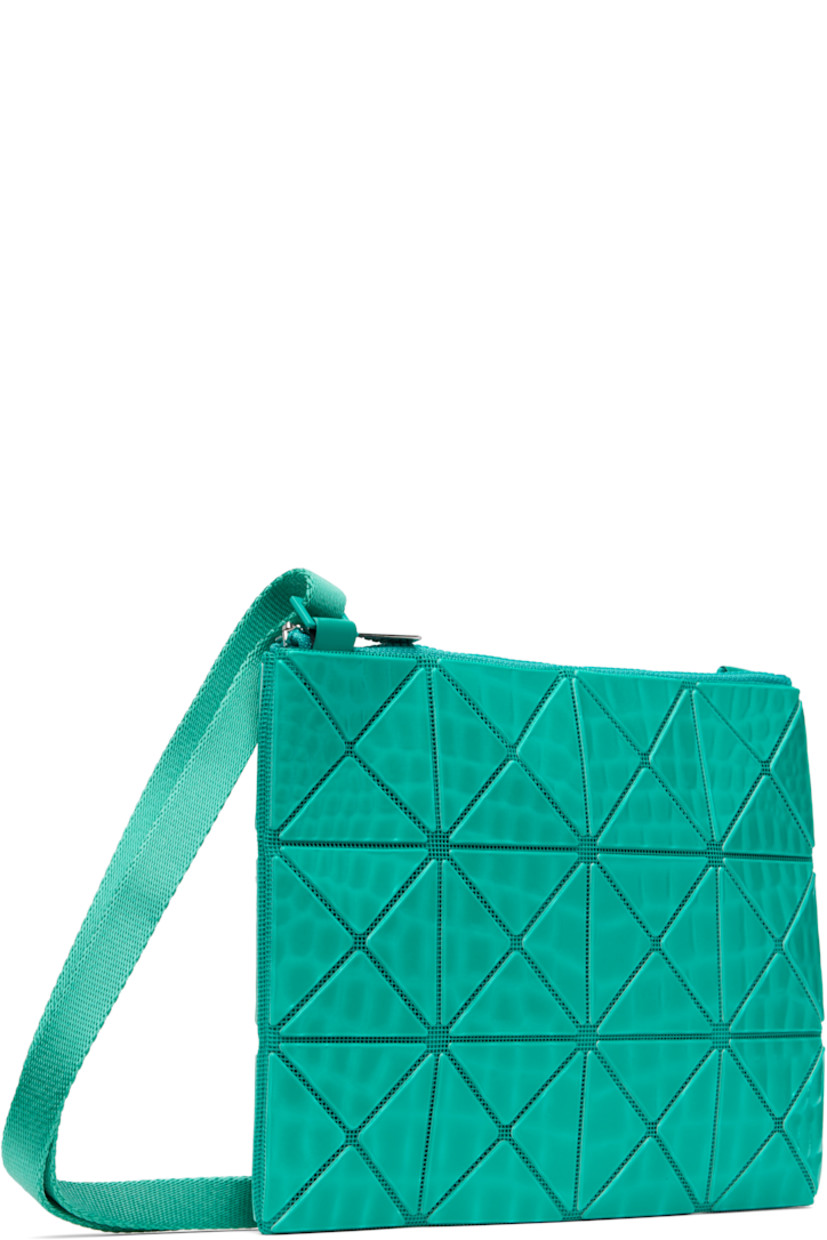 Mesh shoulder bag in green. Croc-embossed signature triangular vinyl appliqués in green throughout.

· Adjustable webbing crossbody strap
· Zip closure 
· Logo-woven canvas lining
· H7" x W9" x D0.25"

Supplier color: Emerald green