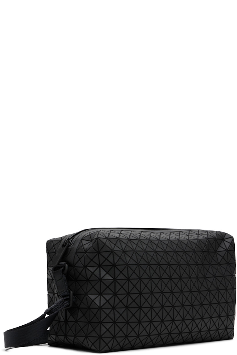 Twill shoulder bag.

· Signature triangular vinyl appliqués throughout
· Adjustable crossbody strap
· Zip closure
· Zip pocket at interior
· H6" x W11.5" x D4.5"

Supplier color: Matte black
