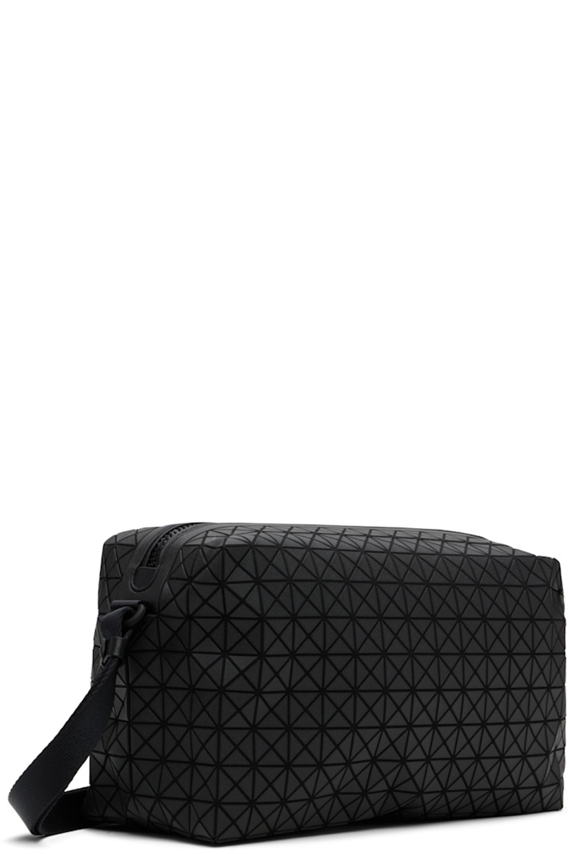 Twill shoulder bag.

· Signature triangular vinyl appliqués throughout
· Adjustable crossbody strap
· Zip closure
· Zip pocket at interior
· H6" x W11.5" x D4.5"

Supplier color: Matte black