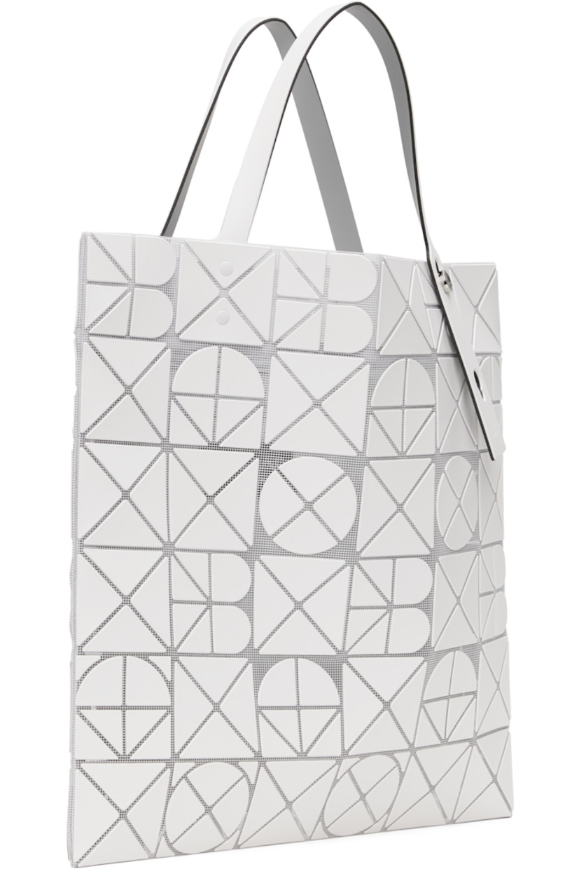 Sheer mesh tote in white. 

· Triangular faux-leather logo appliqués throughout
· Twin adjustable faux-leather carry handles
· Zip pocket at interior
· Unlined
· H13.5" x W13.5"

Supplier color: Matte white