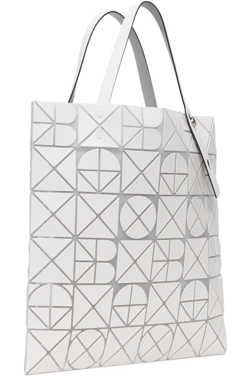 Sheer mesh tote in white. 

· Triangular faux-leather logo appliqués throughout
· Twin adjustable faux-leather carry handles
· Zip pocket at interior
· Unlined
· H13.5" x W13.5"

Supplier color: Matte white
