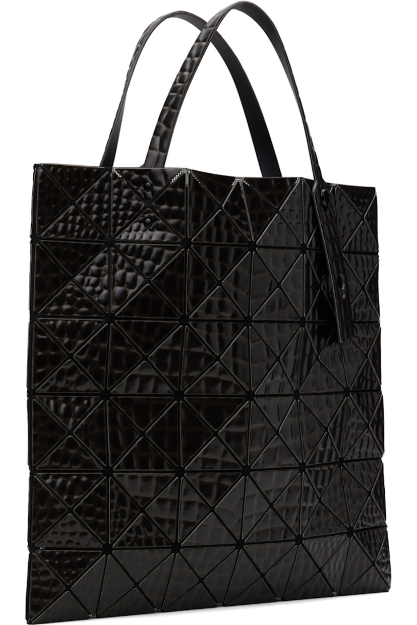 Mesh tote in black.

· Croc-embossed signature triangular vinyl appliqués throughout
· Adjustable carry handles
· Open throat
· Zip pocket at interior
· H13.5" x W13.5"

Supplier color: Black