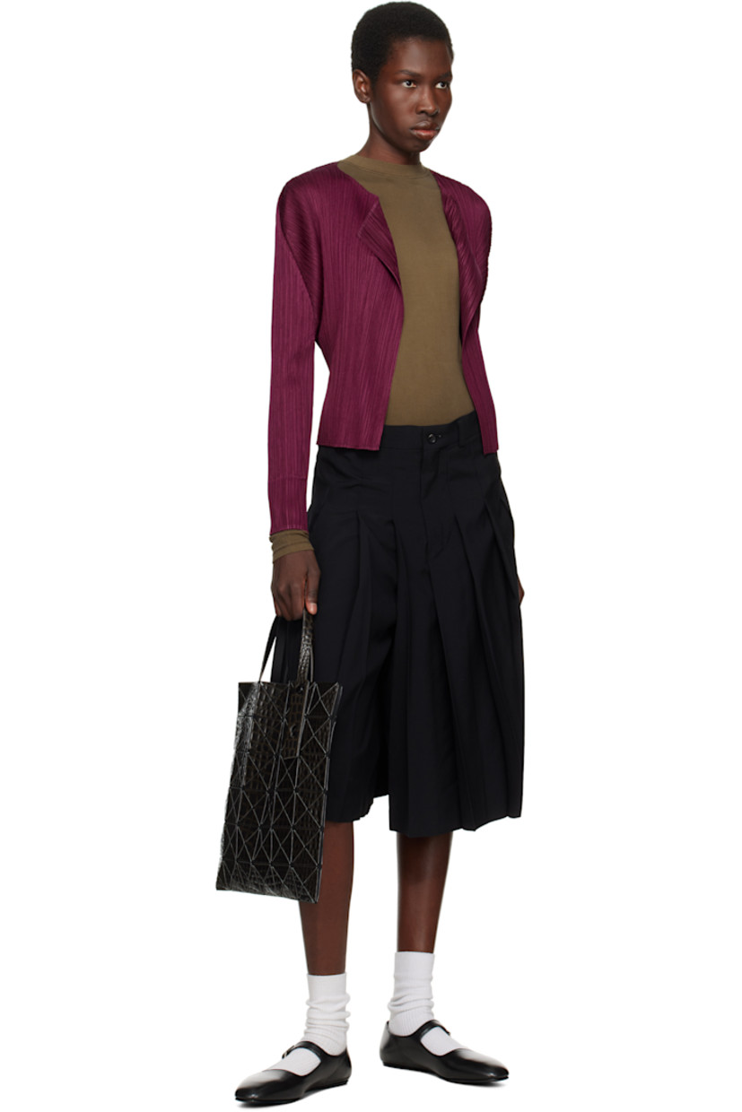 Mesh tote in black.

· Croc-embossed signature triangular vinyl appliqués throughout
· Adjustable carry handles
· Open throat
· Zip pocket at interior
· H13.5" x W13.5"

Supplier color: Black