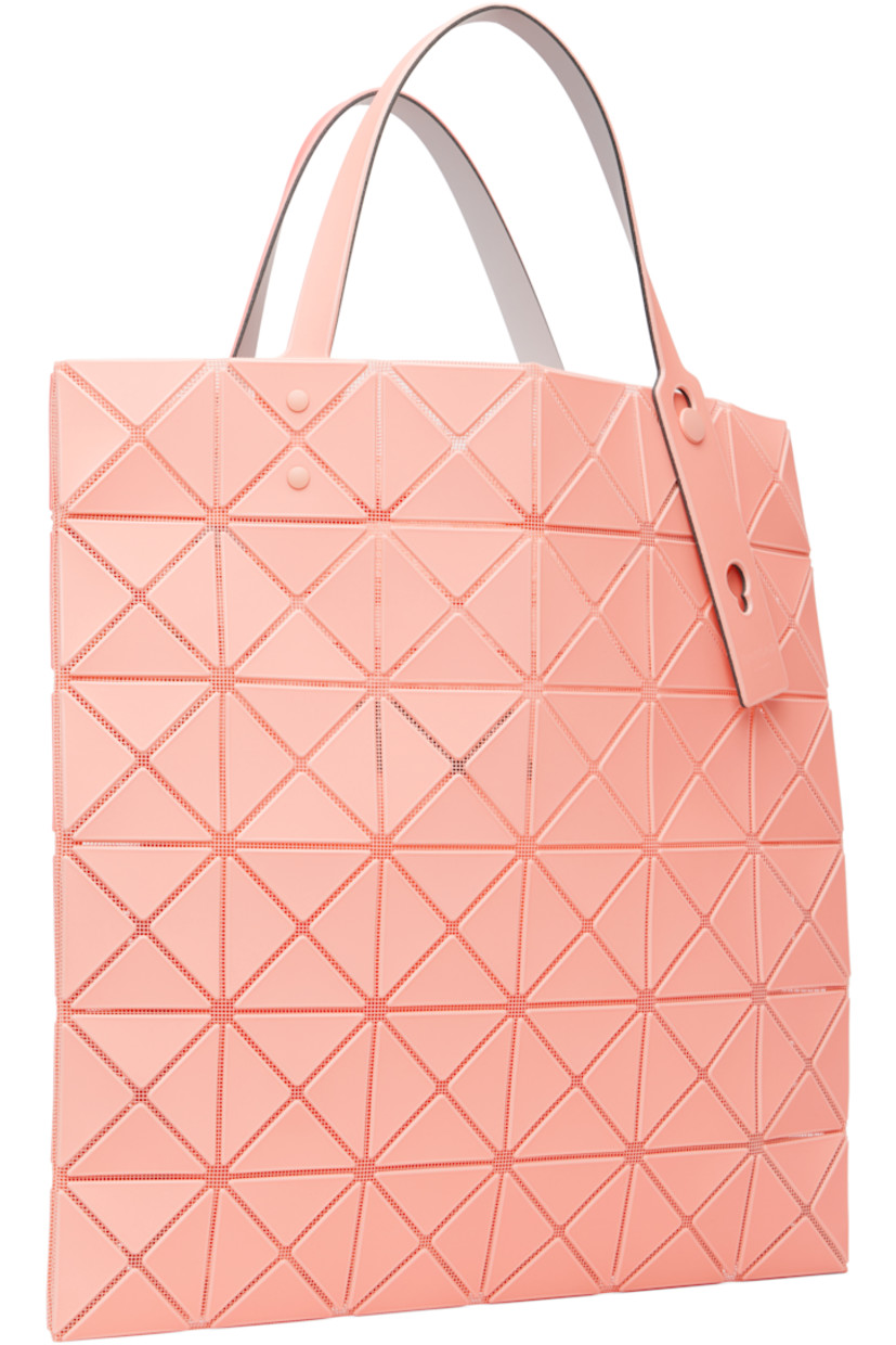 Mesh tote.

· Signature triangular vinyl appliqués throughout
· Adjustable shoulder straps
· Open throat
· Zip pocket at interior
· H13.5" x W13.5"

Supplier color: Light orange/Orange