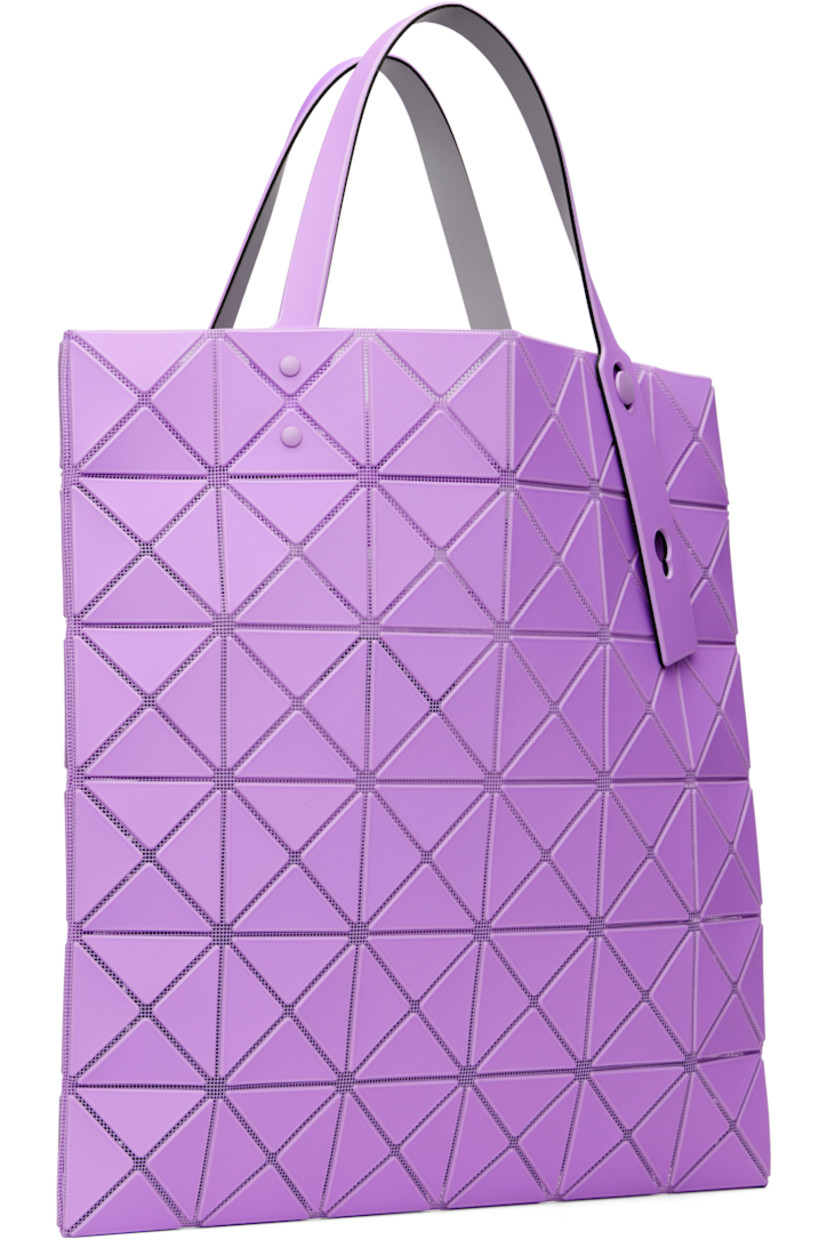 Mesh tote.

· Signature triangular vinyl appliqués throughout
· Adjustable shoulder straps
· Open throat
· Zip pocket at interior
· H13.5" x W13.5"

Supplier color: Light purple/Purple