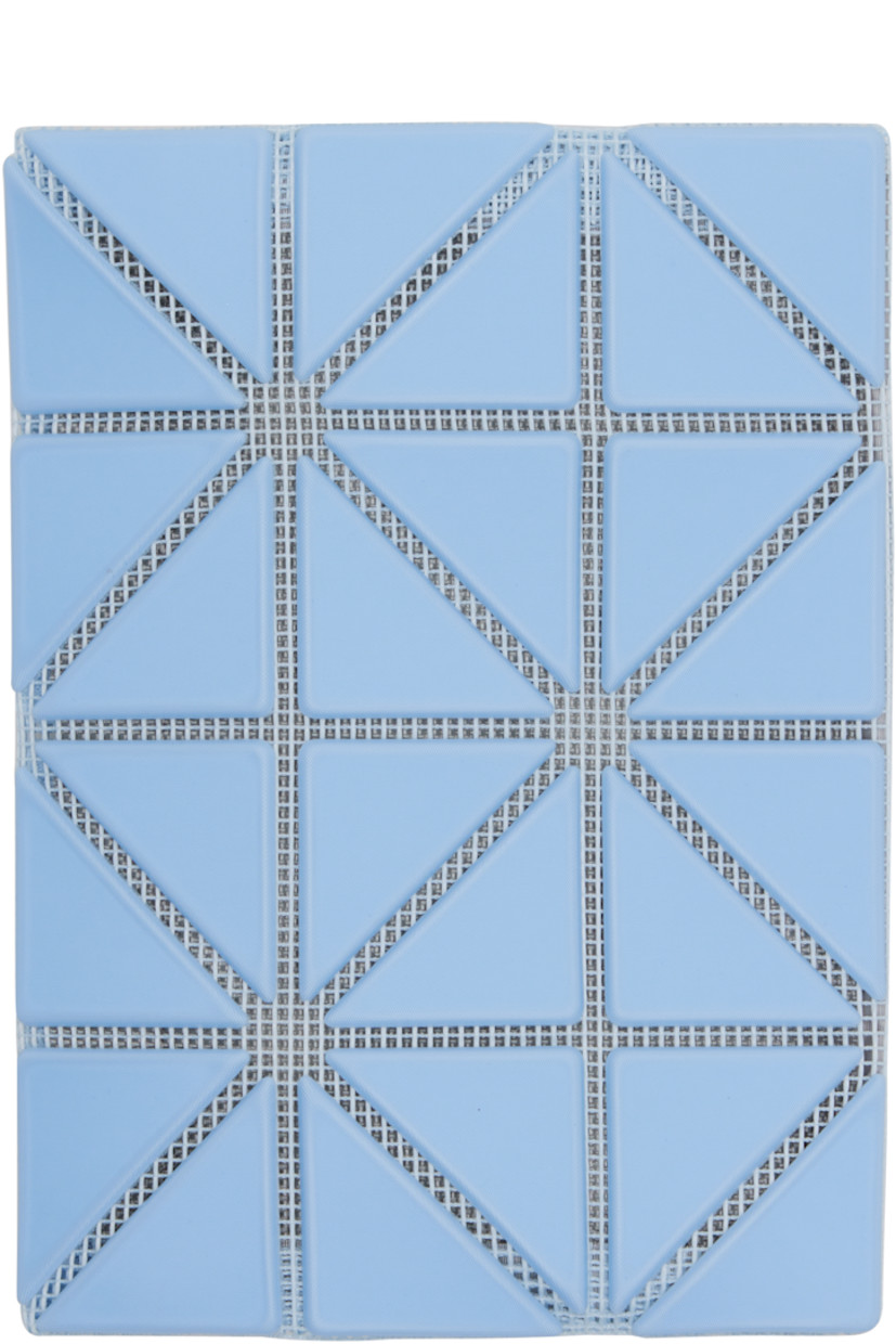 Mesh bifold card holder.

· Signature triangular vinyl appliqués throughout
· Logo embossed at face
· Two patch pockets
· Faille lining
· H3.25" x W4.5"

Supplier color: Light blue/Blue