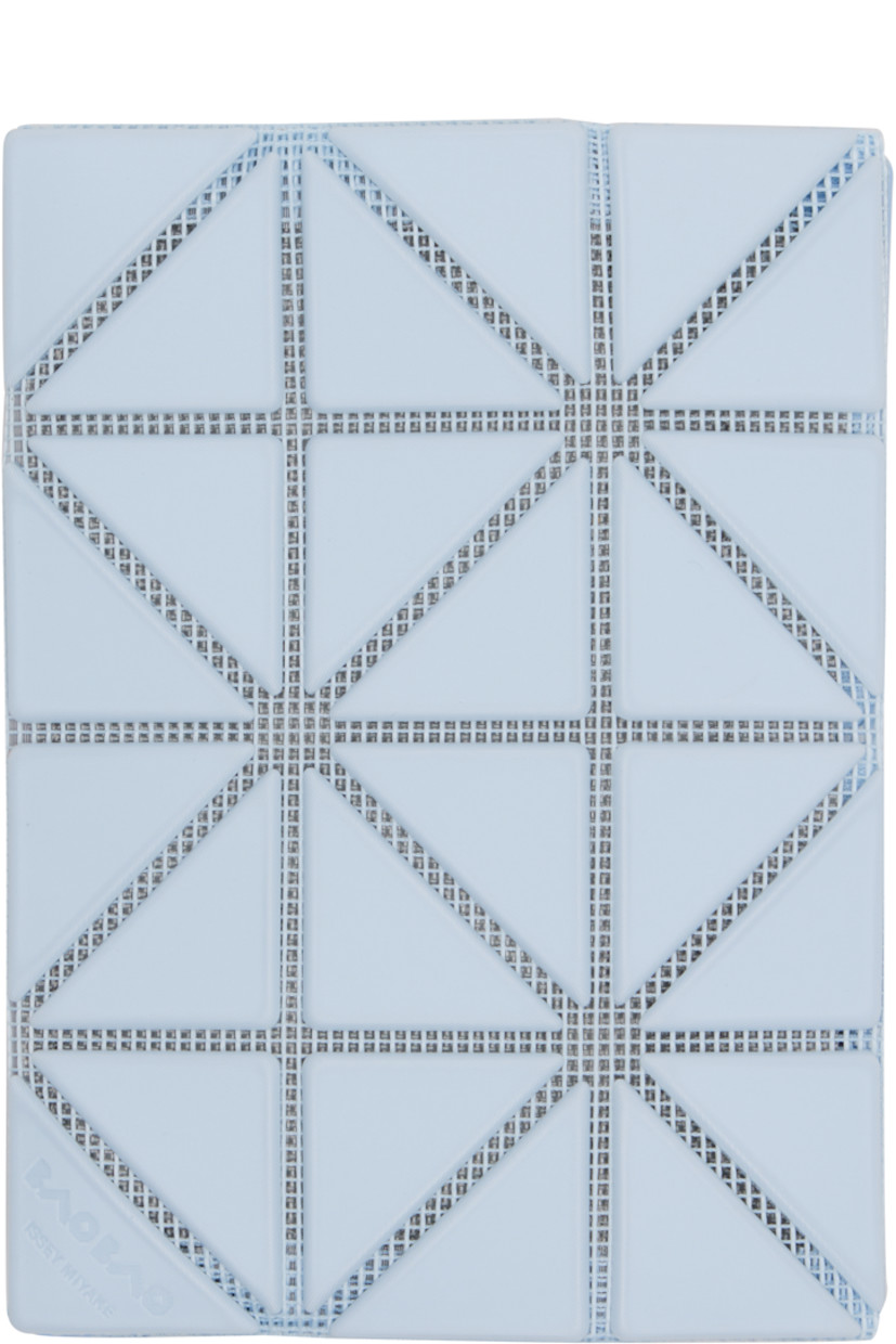 Mesh bifold card holder.

· Signature triangular vinyl appliqués throughout
· Logo embossed at face
· Two patch pockets
· Faille lining
· H3.25" x W4.5"

Supplier color: Light blue/Blue