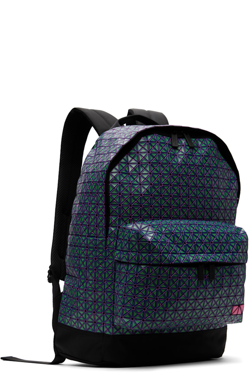 Cotton canvas backpack in black. Signature triangular vinyl appliqués in green and purple throughout.

· Fixed carry handle
· Adjustable padded shoulder straps
· Zip pocket and logo hardware at face
· Padded mesh panel at back face
· Two-way zip closure
· Zip pocket at interior
· Canvas lining
· H17.25" x W15" x D5"

Supplier color: Green