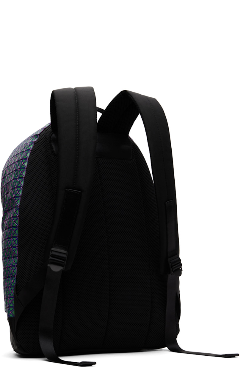 Cotton canvas backpack in black. Signature triangular vinyl appliqués in green and purple throughout.

· Fixed carry handle
· Adjustable padded shoulder straps
· Zip pocket and logo hardware at face
· Padded mesh panel at back face
· Two-way zip closure
· Zip pocket at interior
· Canvas lining
· H17.25" x W15" x D5"

Supplier color: Green