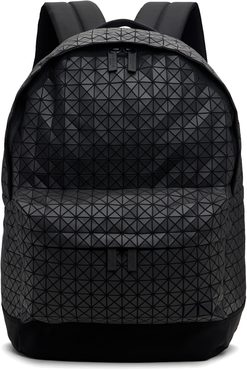 Cotton canvas backpack.

· Signature triangular vinyl appliqués throughout
· Rolled carry handle
· Adjustable padded shoulder straps
· Zip compartment with logo appliqué at face
· Padded mesh back face
· Two-way zip closure
· Zip pocket and patch pockets at interior
· Canvas lining
· H17.25" x W13.23" x D5.75"

Supplier color: Matte black