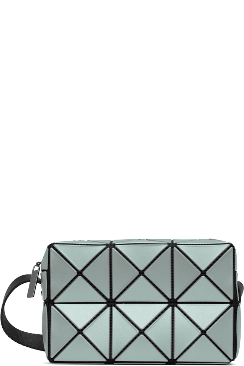 Mesh shoulder bag.

· Signature triangular faux-leather appliqués in blue
· Adjustable and semi-detachable webbing shoulder strap
· Zip closure
· Patch pocket at interior
· Logo-woven lining
· H4.5" x W7" x D2.25"

Supplier color: Light blue