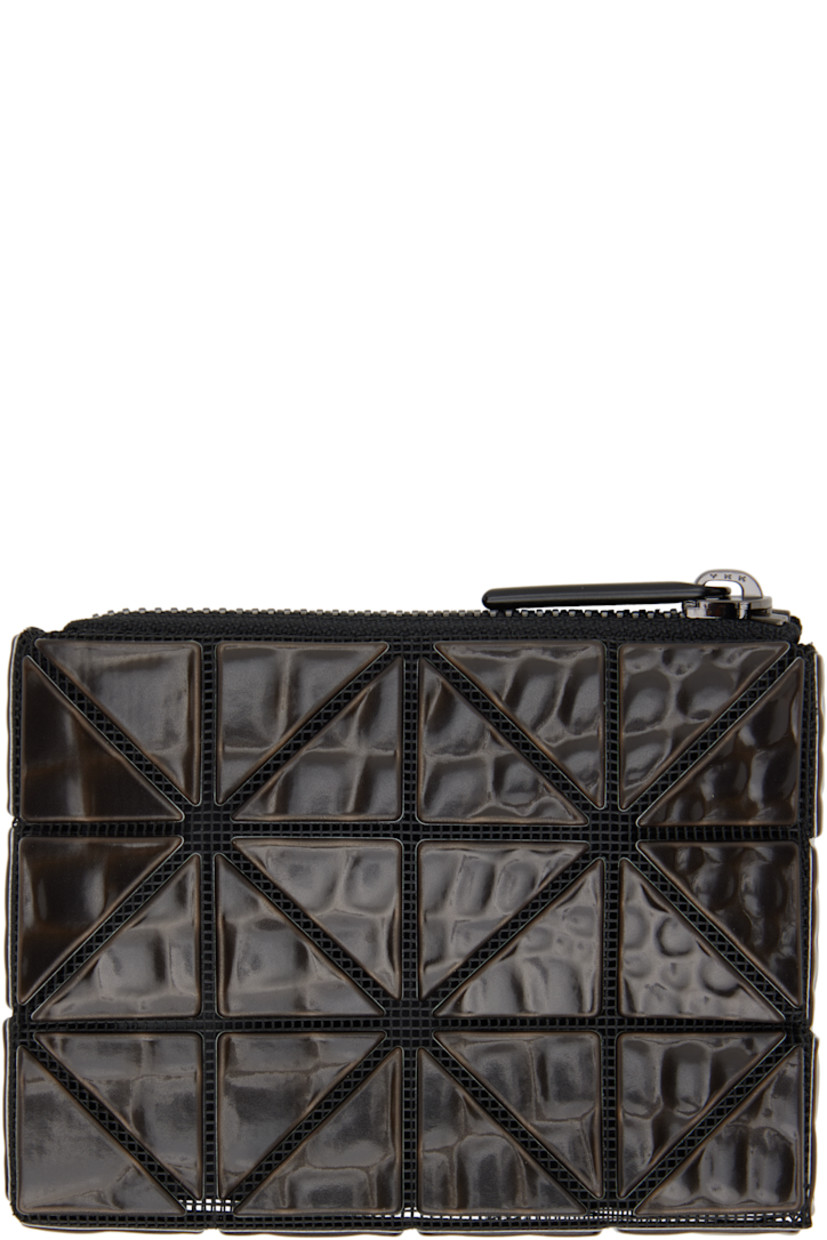 Mesh wallet in black. Croc-embossed signature triangular vinyl appliqués throughout.

· Zip closure
· D-ring and card slot at interior 
· Satin lining 
· Gunmetal-tone hardware
· H3.5" x W4.5" x D0.5"

Supplier color: Black
