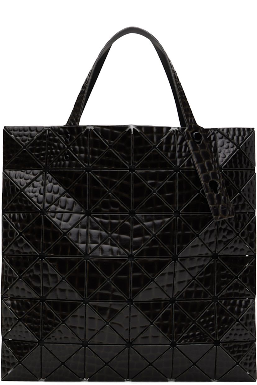 Mesh tote in black.

· Croc-embossed signature triangular vinyl appliqués throughout
· Adjustable carry handles
· Open throat
· Zip pocket at interior
· H13.5" x W13.5"

Supplier color: Black