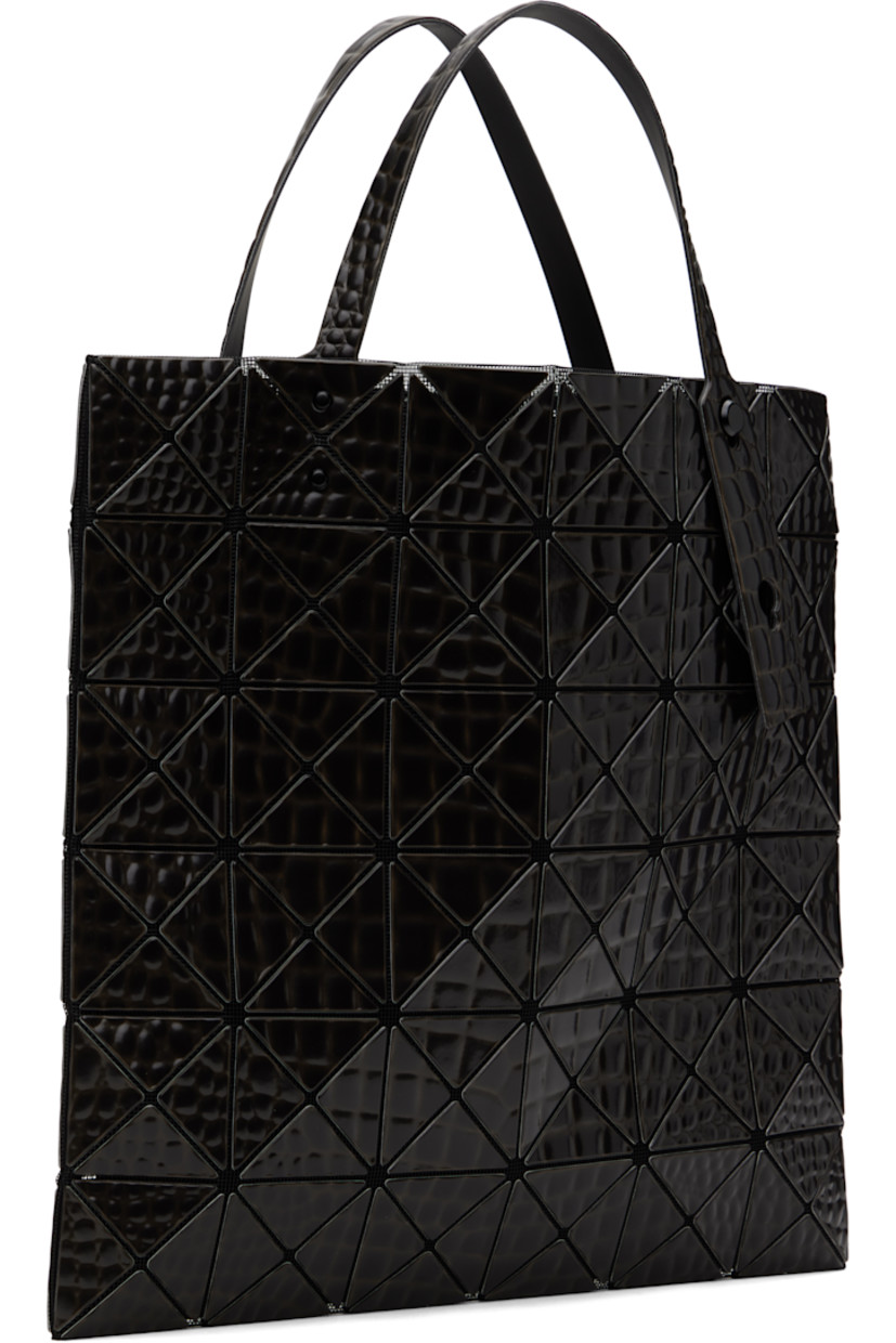 Mesh tote in black.

· Croc-embossed signature triangular vinyl appliqués throughout
· Adjustable carry handles
· Open throat
· Zip pocket at interior
· H13.5" x W13.5"

Supplier color: Black