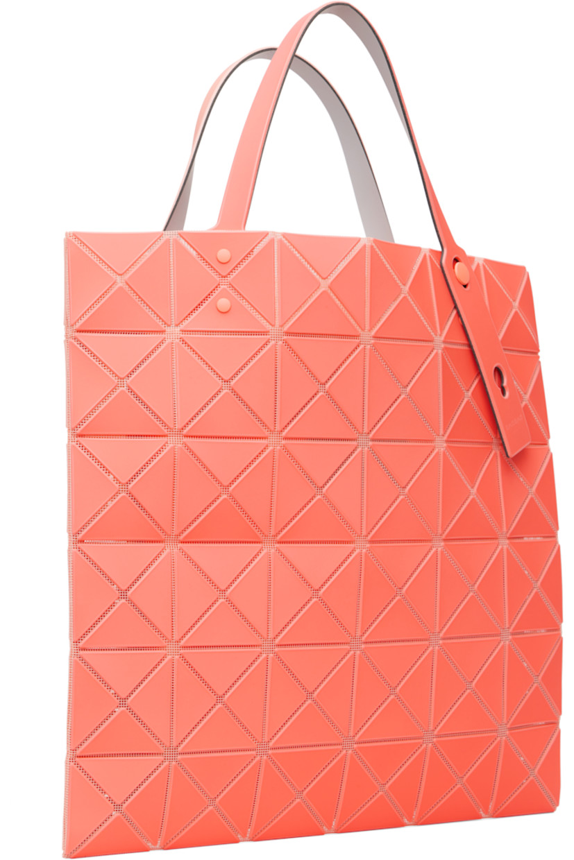 Mesh tote.

· Signature triangular vinyl appliqués throughout
· Adjustable shoulder straps
· Open throat
· Zip pocket at interior
· H13.5" x W13.5"

Supplier color: Light orange/Orange