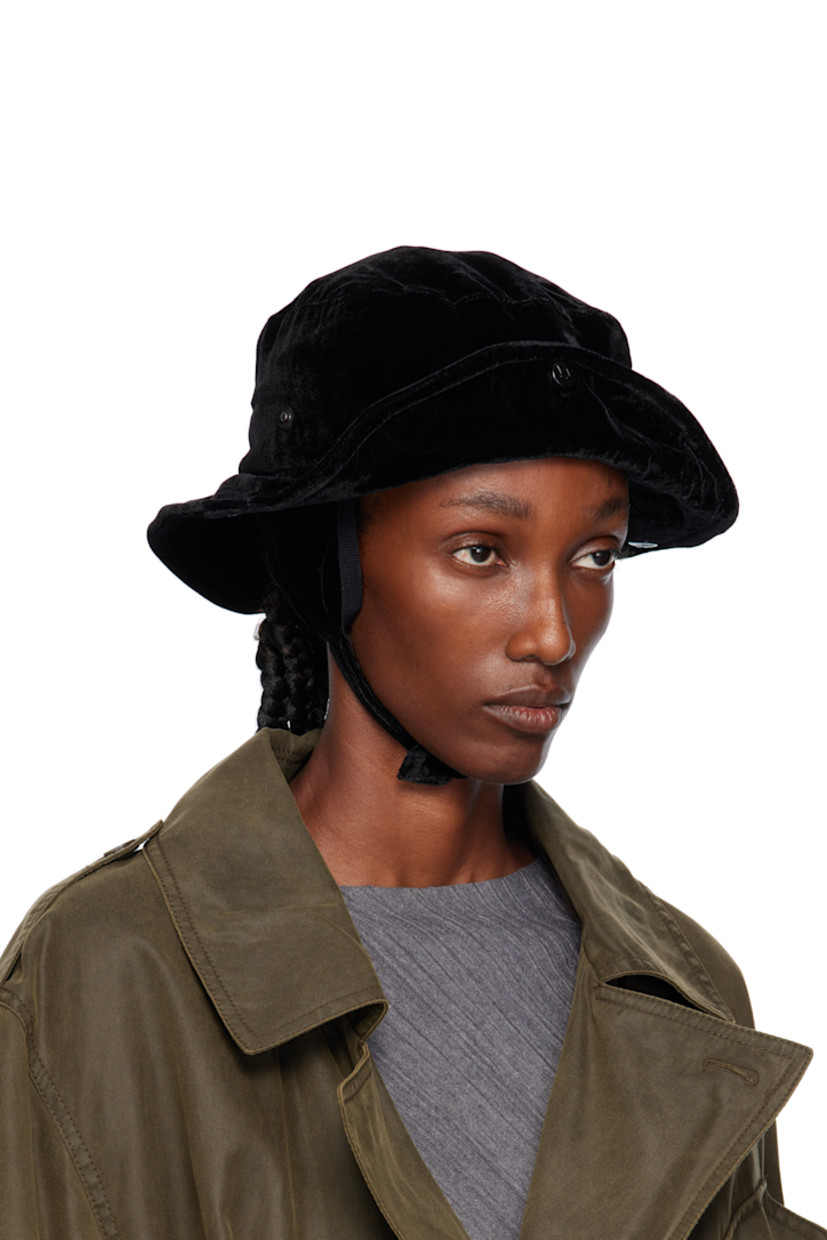 Rayon-blend velvet bucket hat.

· Logo embroidered at face
· Press-stud fastening at sides and back
· Pliable wire at brim
· Detachable ear flaps with press-stud chin strap
· Satin twill lining
· Logo-engraved hardware

Supplier color: Black