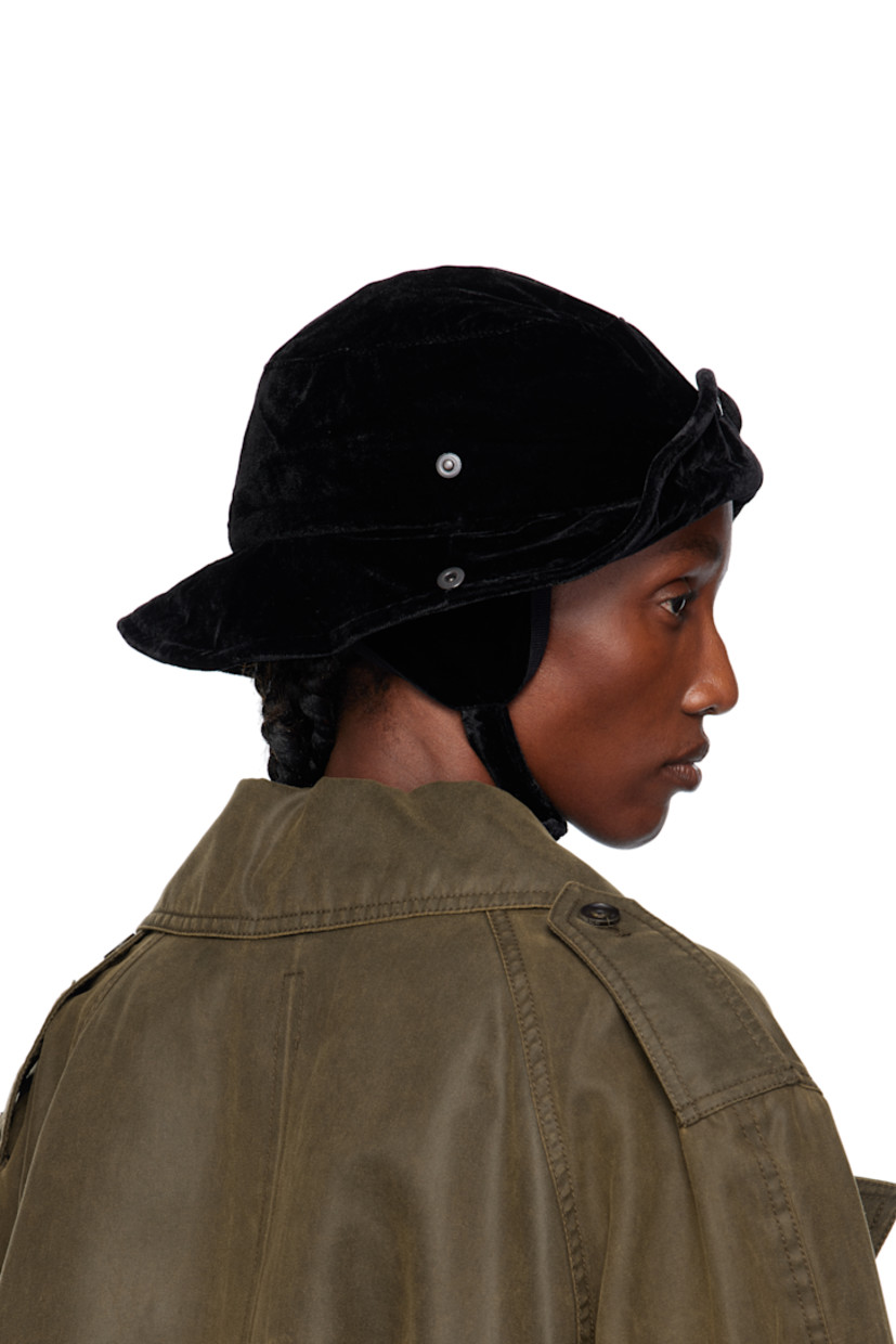Rayon-blend velvet bucket hat.

· Logo embroidered at face
· Press-stud fastening at sides and back
· Pliable wire at brim
· Detachable ear flaps with press-stud chin strap
· Satin twill lining
· Logo-engraved hardware

Supplier color: Black