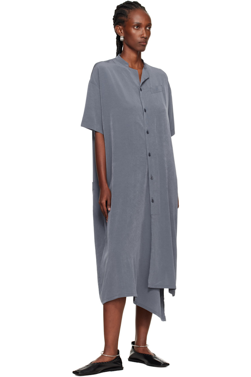 Triacetate-blend sateen midi dress.

· Notched band collar 
· Button closure
· Welt pocket at chest
· Vented drop-tail hem 
· Dropped shoulders 
· Patch pockets at back 

Supplier color: Blue/Grey