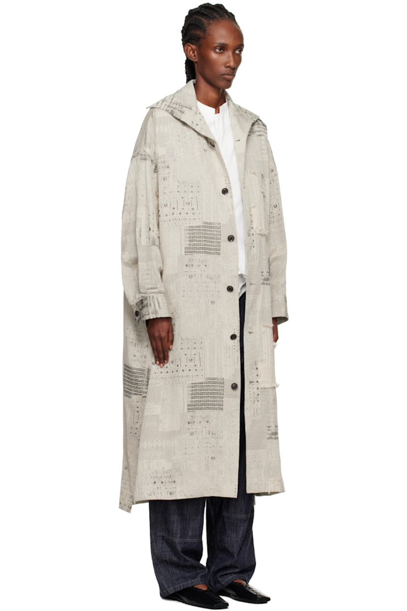 Plain-woven cotton coat.

· Woven pattern with fringed detailing throughout 
· Spread collar 
· Button closure
· Welt pockets at front 
· Vented side seams 
· Dropped shoulders
· Pleats at buttoned barrel cuffs
· Box pleat at back yoke 
· Unlined

Supplier color: Ivory