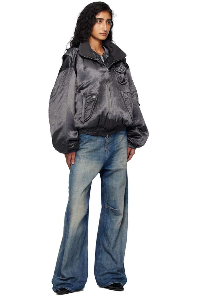 Insulated satin bomber jacket. 

· Stand collar
· Two-way zip closure
· Patch pocket at chest
· Flap pockets at waist
· Elasticized hem and cuffs
· Dropped shoulders
· Utility pocket and pen slots at sleeve
· Rib-knit interior collar 
· Welt pocket at interior 
· Twill lining
· Logo-engraved silver-tone hardware 

Supplier color: Charcoal