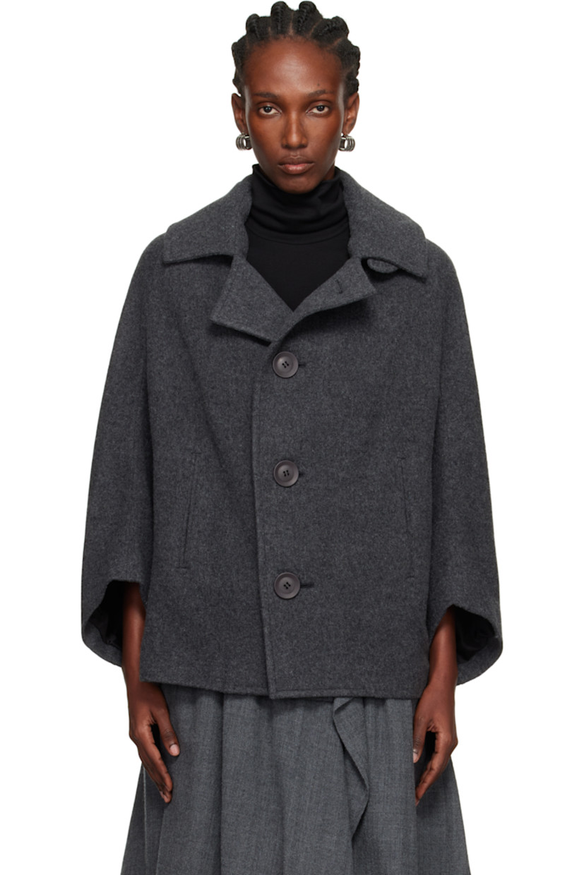 Brushed wool-blend melton coat. 

· Spread collar 
· Button closure
· Welt pockets at front 
· Saddle shoulders
· Full cupro satin lining 

Supplier color: Grey