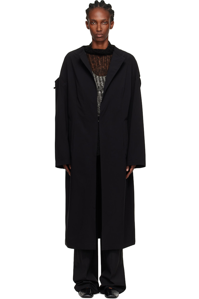 Plain-woven coat. 

· Round neck
· Single hook-eye closure 
· Welt pockets at waist
· Self-tie straps at sleeves
· Unlined

Supplier color: Black