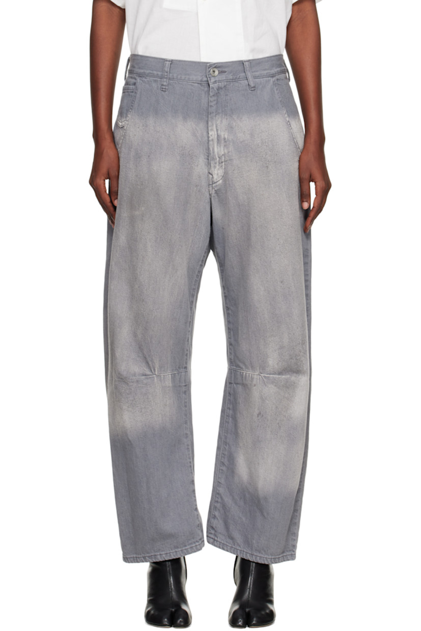 Non-stretch denim jeans.

· Wide-leg 
· Fading and whiskering throughout 
· Belt loops
· Five-pocket styling
· Zip fly 
· Tucks at legs
· Gusset at inseam

Supplier color: Grey