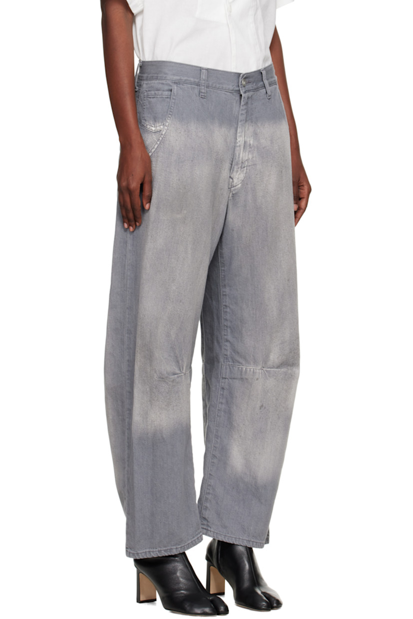 Non-stretch denim jeans.

· Wide-leg 
· Fading and whiskering throughout 
· Belt loops
· Five-pocket styling
· Zip fly 
· Tucks at legs
· Gusset at inseam

Supplier color: Grey
