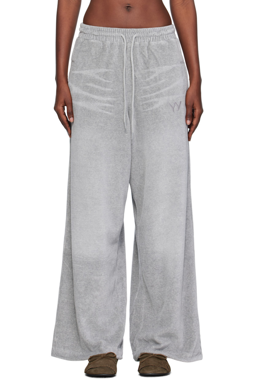Cotton-blend velour lounge pants.

· Whiskering throughout
· Wide-leg
· Drawstring at elasticized waistband
· Four-pocket styling
· Gathering at waist
· Logo embroidered at front

Supplier color: Gray