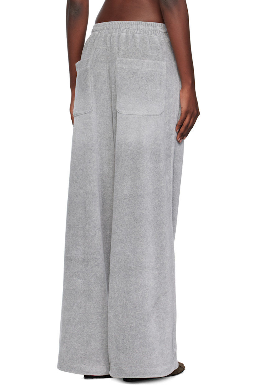 Cotton-blend velour lounge pants.

· Whiskering throughout
· Wide-leg
· Drawstring at elasticized waistband
· Four-pocket styling
· Gathering at waist
· Logo embroidered at front

Supplier color: Gray