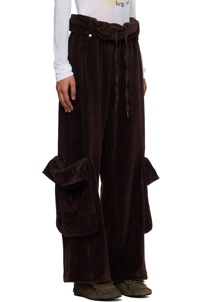 Cotton-blend velour cargo pants.

· Drawstring at elasticized foldover waistband
· Belt loops
· Two-pocket styling
· Cargo pocket at outseams
· Partial jersey lining

Supplier color: Brown