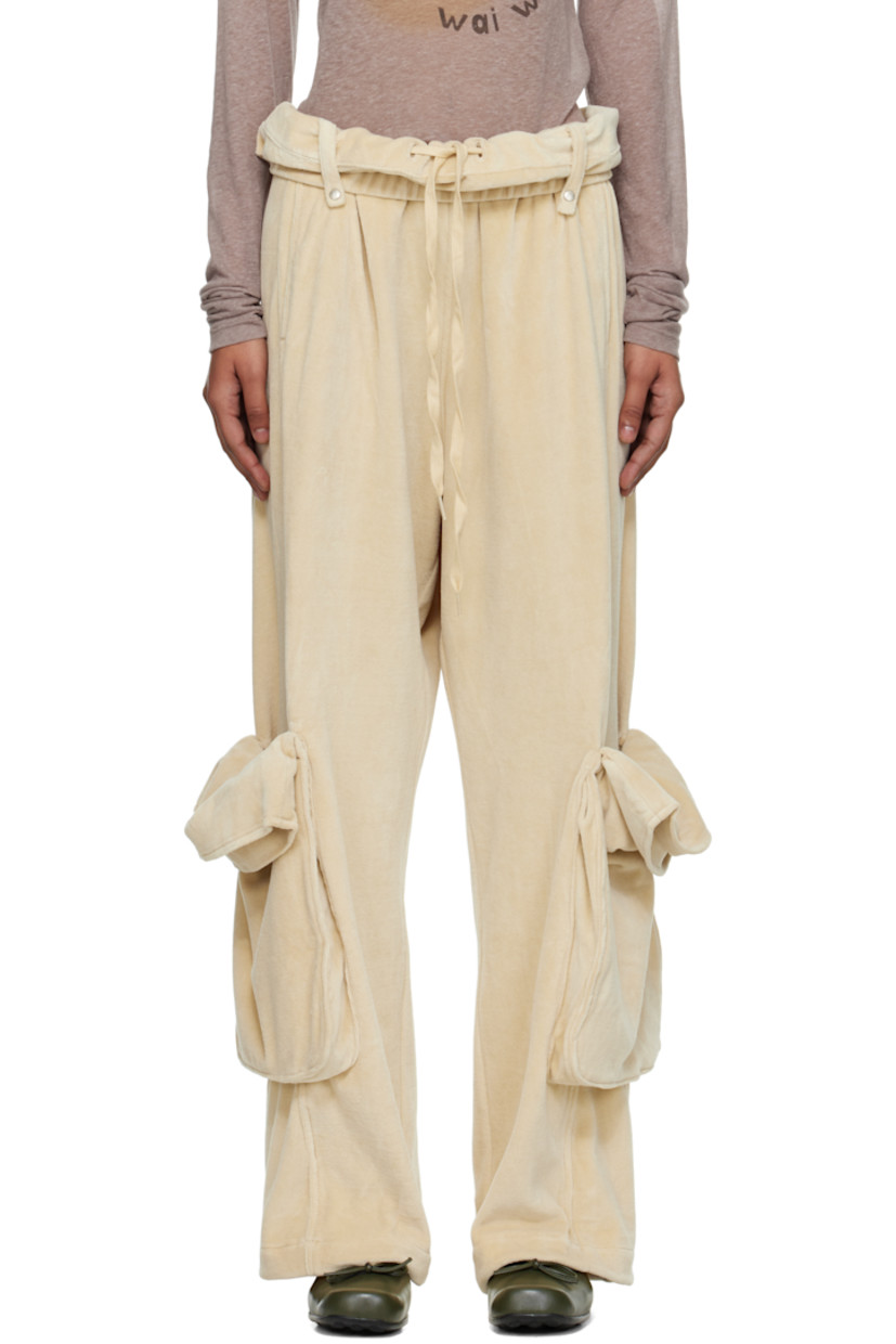 Cotton-blend velour cargo pants.

· Drawstring at elasticized foldover waistband
· Belt loops
· Two-pocket styling
· Cargo pocket at outseams
· Partial jersey lining

Supplier color: Cream