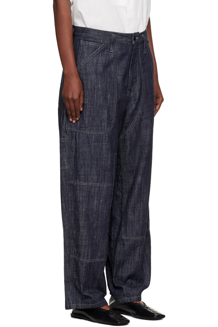 Non-stretch denim jeans.

· Belt loops
· Drawstring at waistband
· Five-pocket styling
· Zip fly 
· Logo patch at back waistband
· Contrast stitching in beige

Supplier color: Indigo