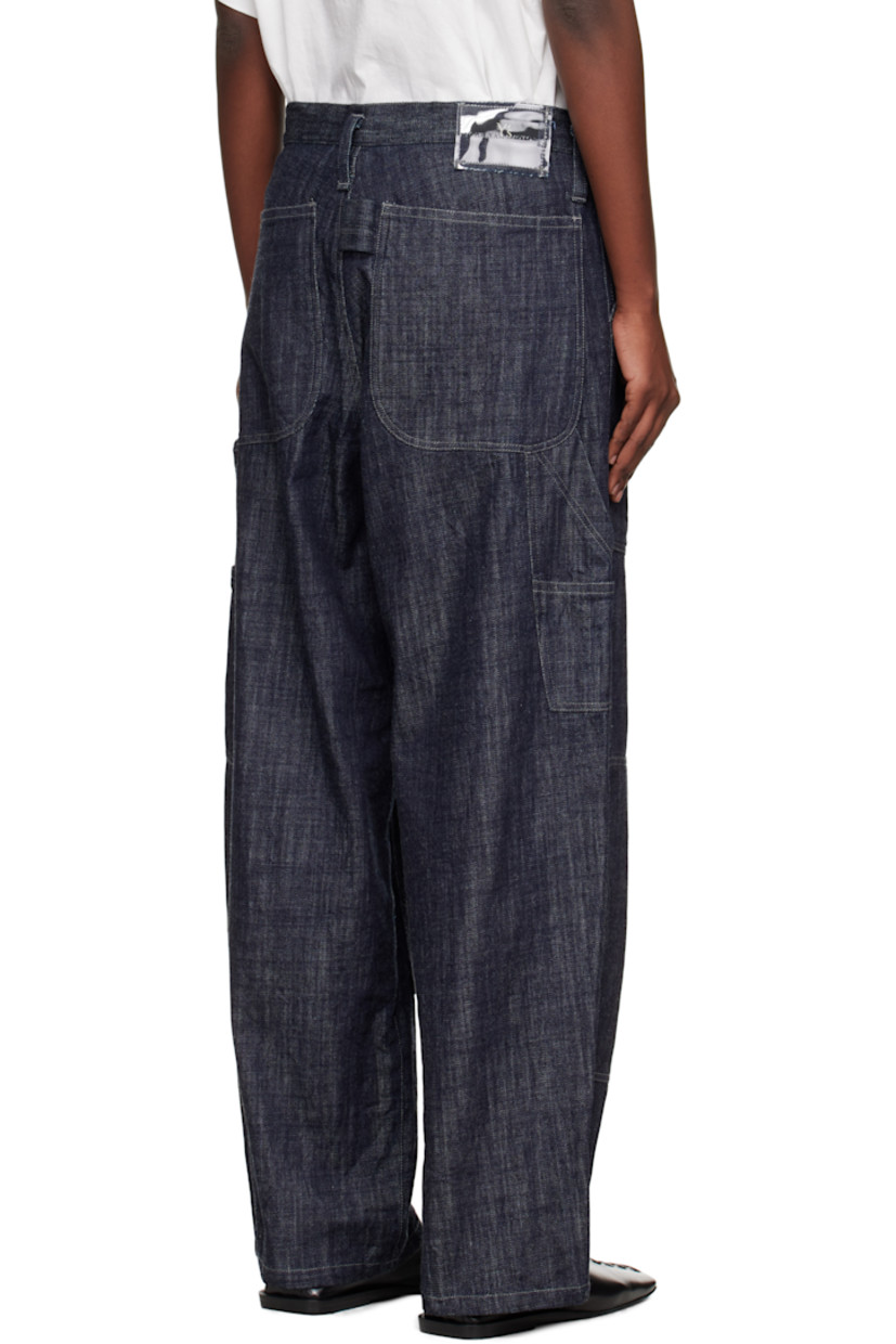 Non-stretch denim jeans.

· Belt loops
· Drawstring at waistband
· Five-pocket styling
· Zip fly 
· Logo patch at back waistband
· Contrast stitching in beige

Supplier color: Indigo