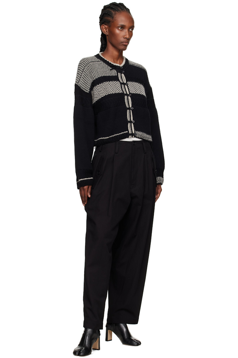 Cotton twill trousers.

· Belt loops
· Cinch tabs at waistband
· Three-pocket styling
· Zip fly 
· Pleats at front 
· Dropped inseam 

Supplier color: Black
