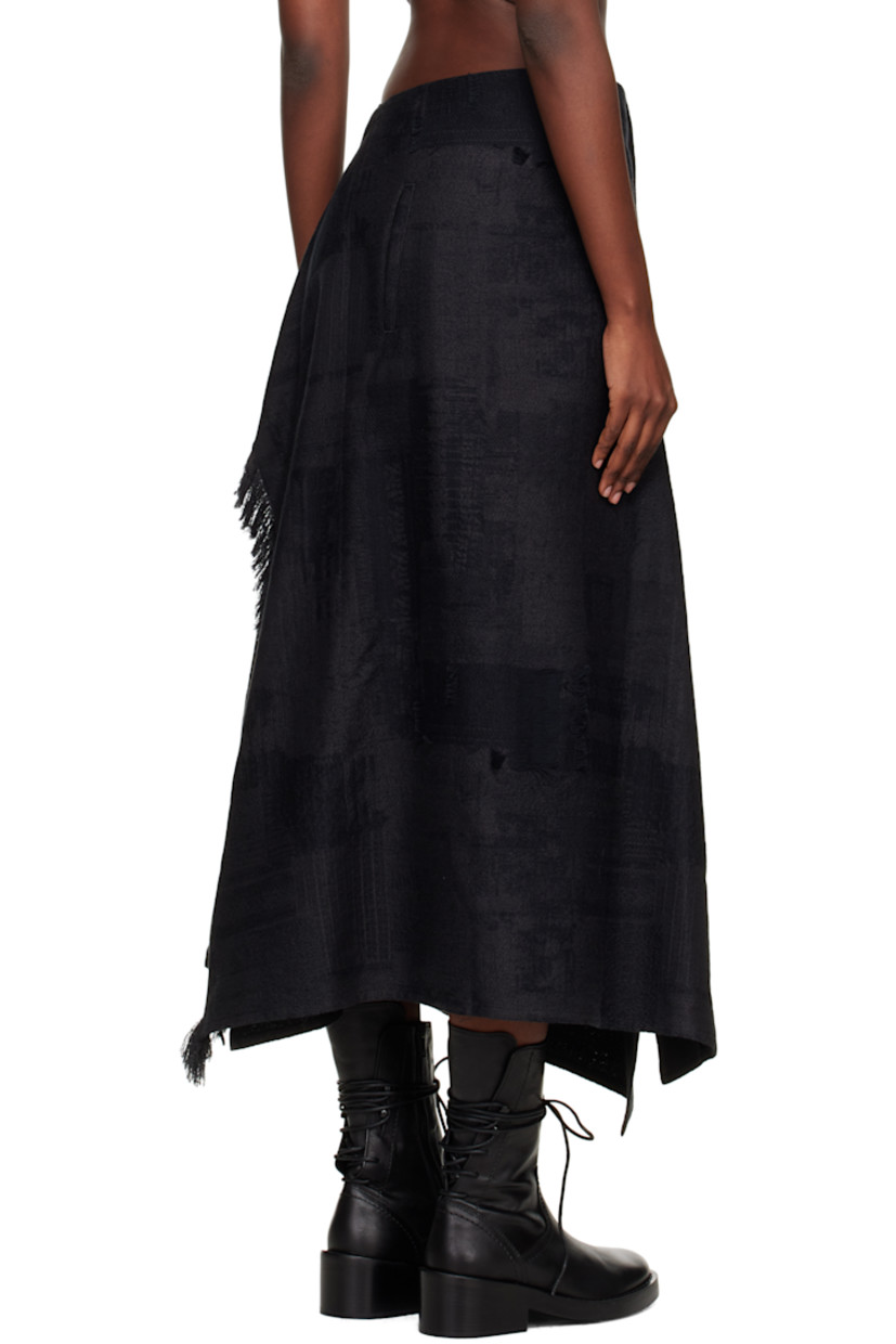 Plain-woven cotton maxi skirt. 

· Wrap construction
· Jacquard graphics and fringed detailing throughout 
· Button fastening at waistband
· Single-pocket styling
· Unlined

Supplier color: Grey