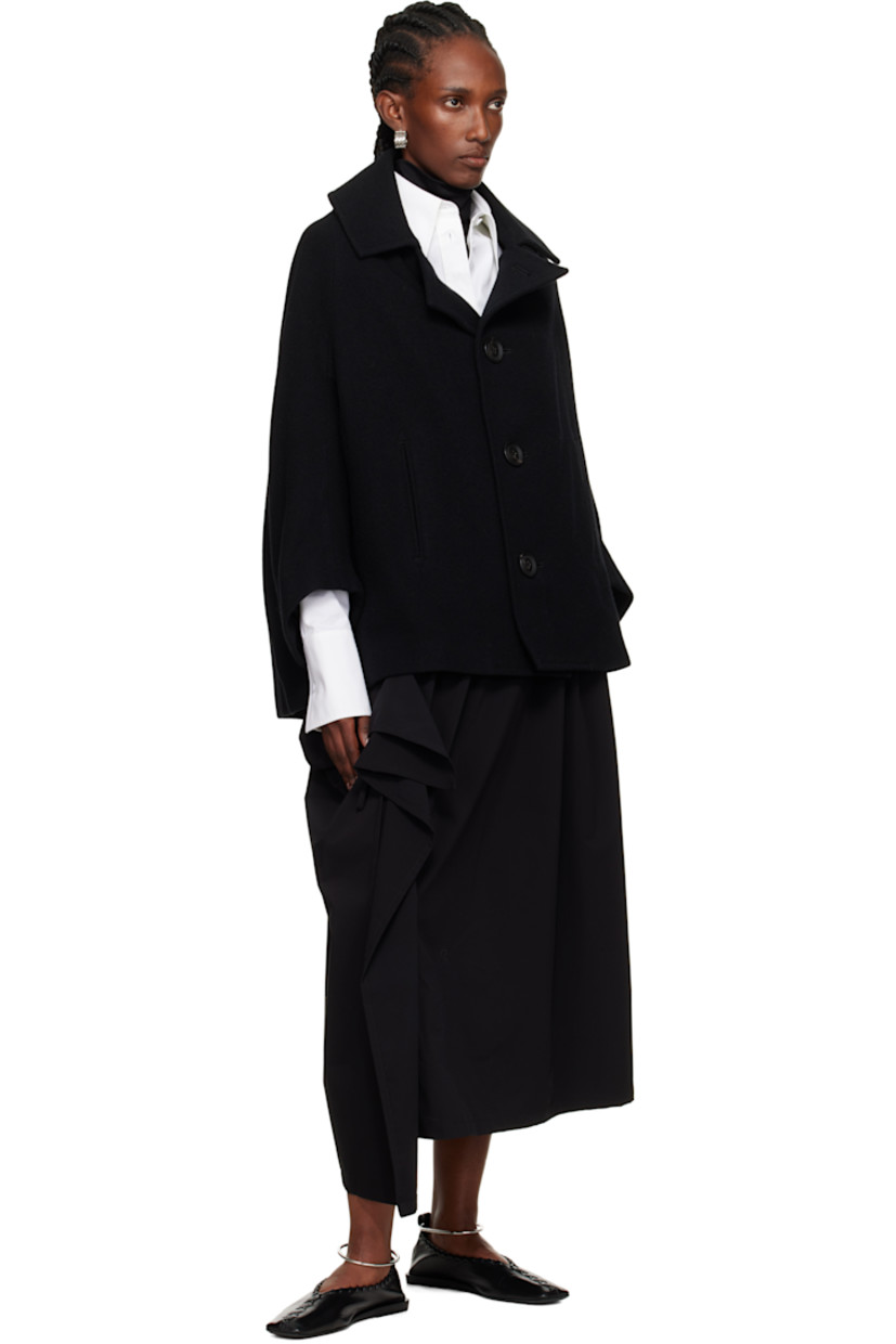 Plain-woven maxi skirt. 

· Concealed drawstring at elasticized waistband
· Single-pocket styling
· Gathering and self-tie panel at side seam

Supplier color: Black