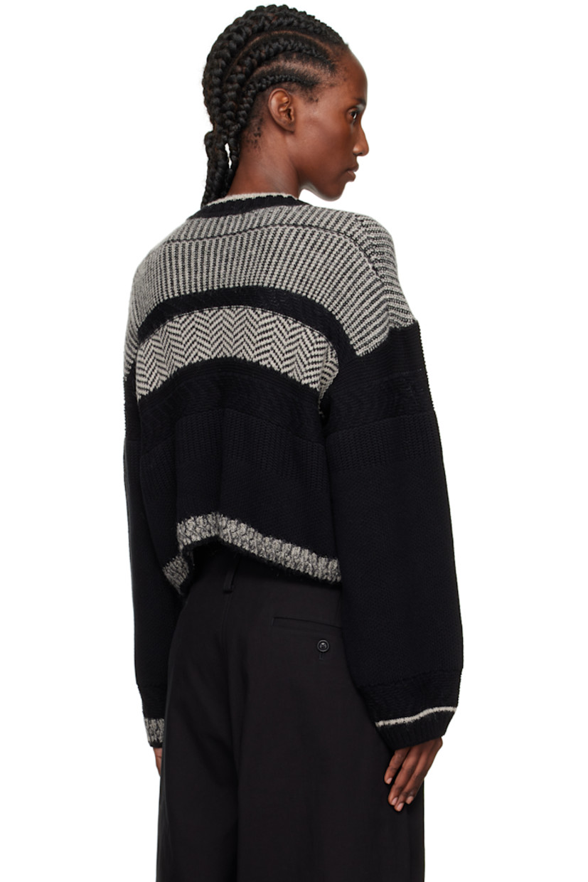 Knit cotton-blend cardigan.

· Intarsia graphic stripes throughout 
· Rib-knit crewneck, hem, and cuffs
· Button closure
· Cropped hem 
· Dropped shoulders 

Supplier color: Black/White