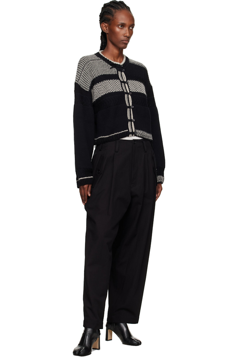 Knit cotton-blend cardigan.

· Intarsia graphic stripes throughout 
· Rib-knit crewneck, hem, and cuffs
· Button closure
· Cropped hem 
· Dropped shoulders 

Supplier color: Black/White