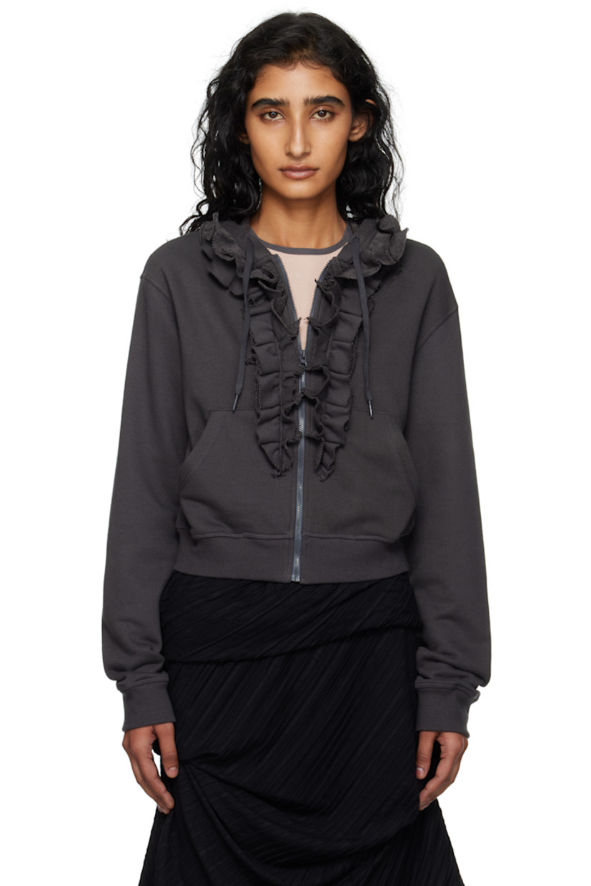 French terry hoodie.

· Drawstring at hood
· Zip closure
· Ruffled trim and patch pockets at front
· Rib-knit hem and cuffs

Supplier color: Charcoal