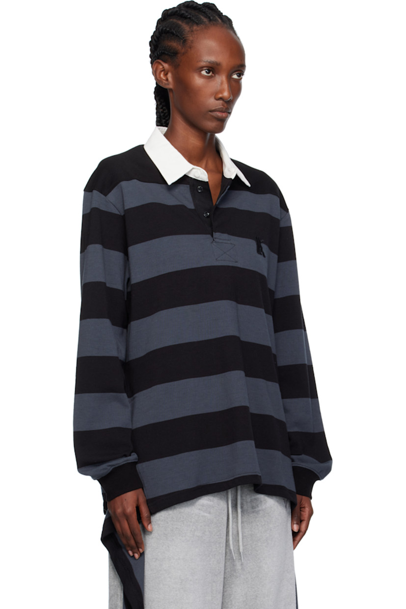 Cotton jersey polo.

· Striped throughout
· Twill spread collar
· Concealed four-button placket
· Logo embroidered at chest
· Extended trim at vented side seams
· Dropped shoulders
· Rib-knit cuffs

Supplier color: Charcoal