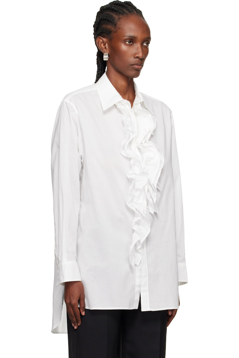 Cotton gauze shirt. 

· Spread collar 
· Ruffled appliqué at button closure 
· Droptail hem 
· Dropped shoulders
· Pleats at buttoned barrel cuffs

Supplier color: Off white
