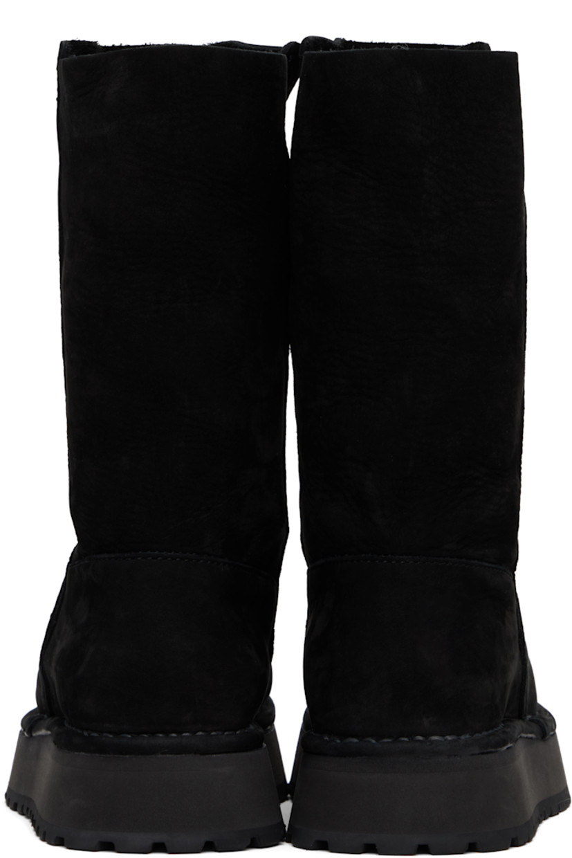 Mid-calf nubuck boots.

· Suede lining
· Topstitching at welt
· Foam rubber midsole
· Treaded rubber sole

Supplier color: Black