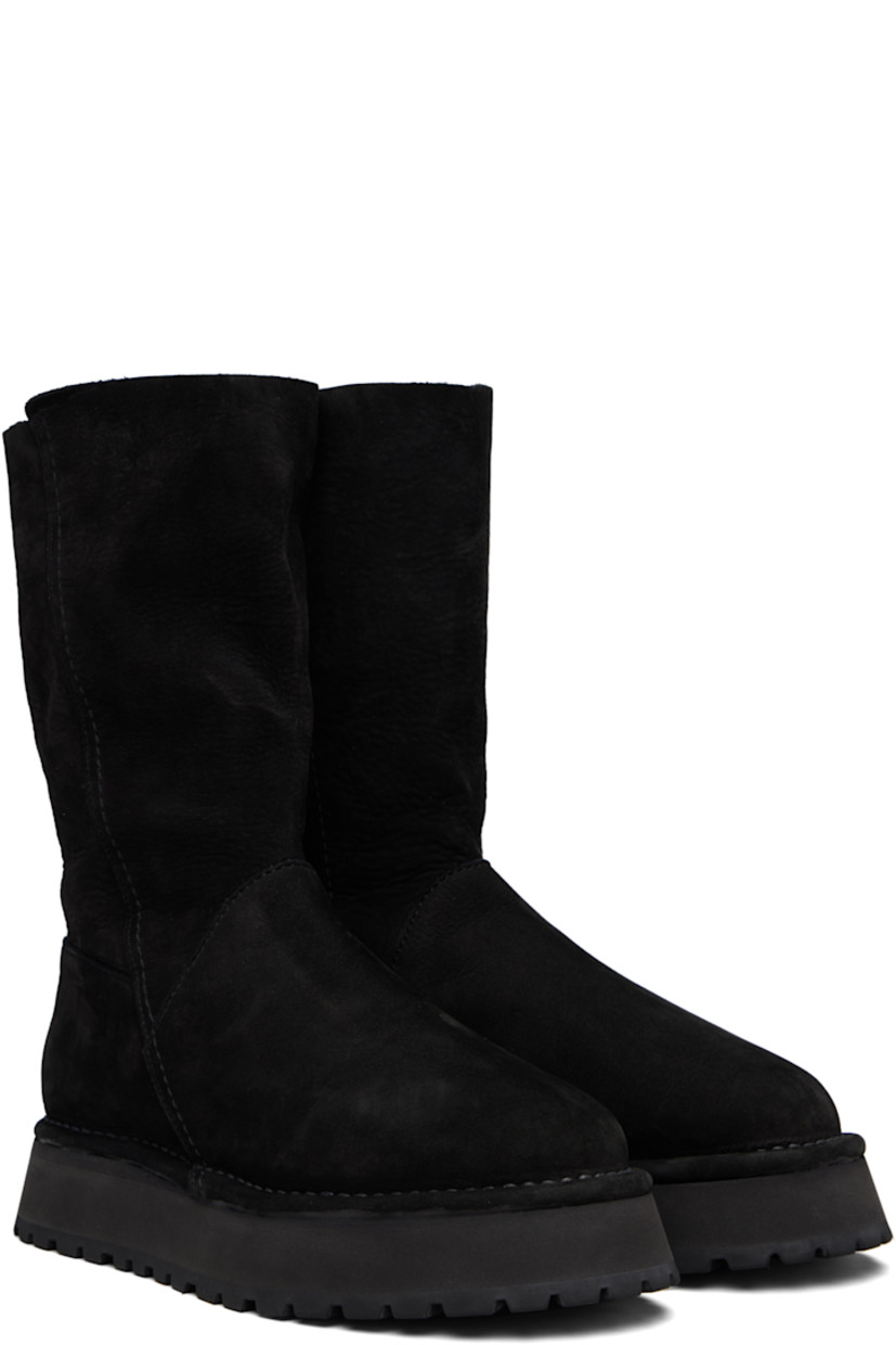 Mid-calf nubuck boots.

· Suede lining
· Topstitching at welt
· Foam rubber midsole
· Treaded rubber sole

Supplier color: Black