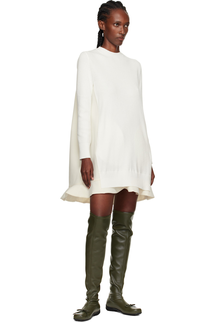 Thigh-high grained faux-leather boots. 

· Square toe 
· Bow accent at vamp
· Treaded rubber sole

Supplier color: Khaki