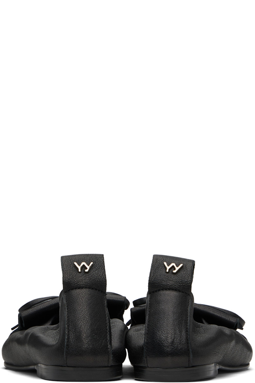Grained sheepskin ballerina flats.

· Fringed detailing and bow at vamp
· Pull-loop with logo hardware at heel collar
· Buffed pigskin lining
· Rubber sole

Supplier color: Black