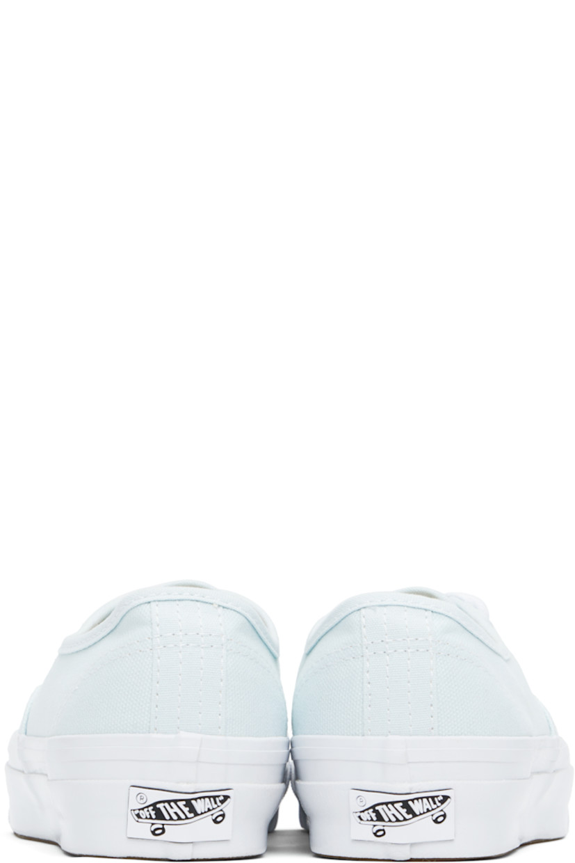 Low-top duck canvas sneakers in blue. 

· Lace-up closure
· Logo flag at outer side
· Rubberized logo patch at heel
· Textured rubber midsole
· Treaded rubber sole
· Contrast stitching in white

Supplier color: Blue
